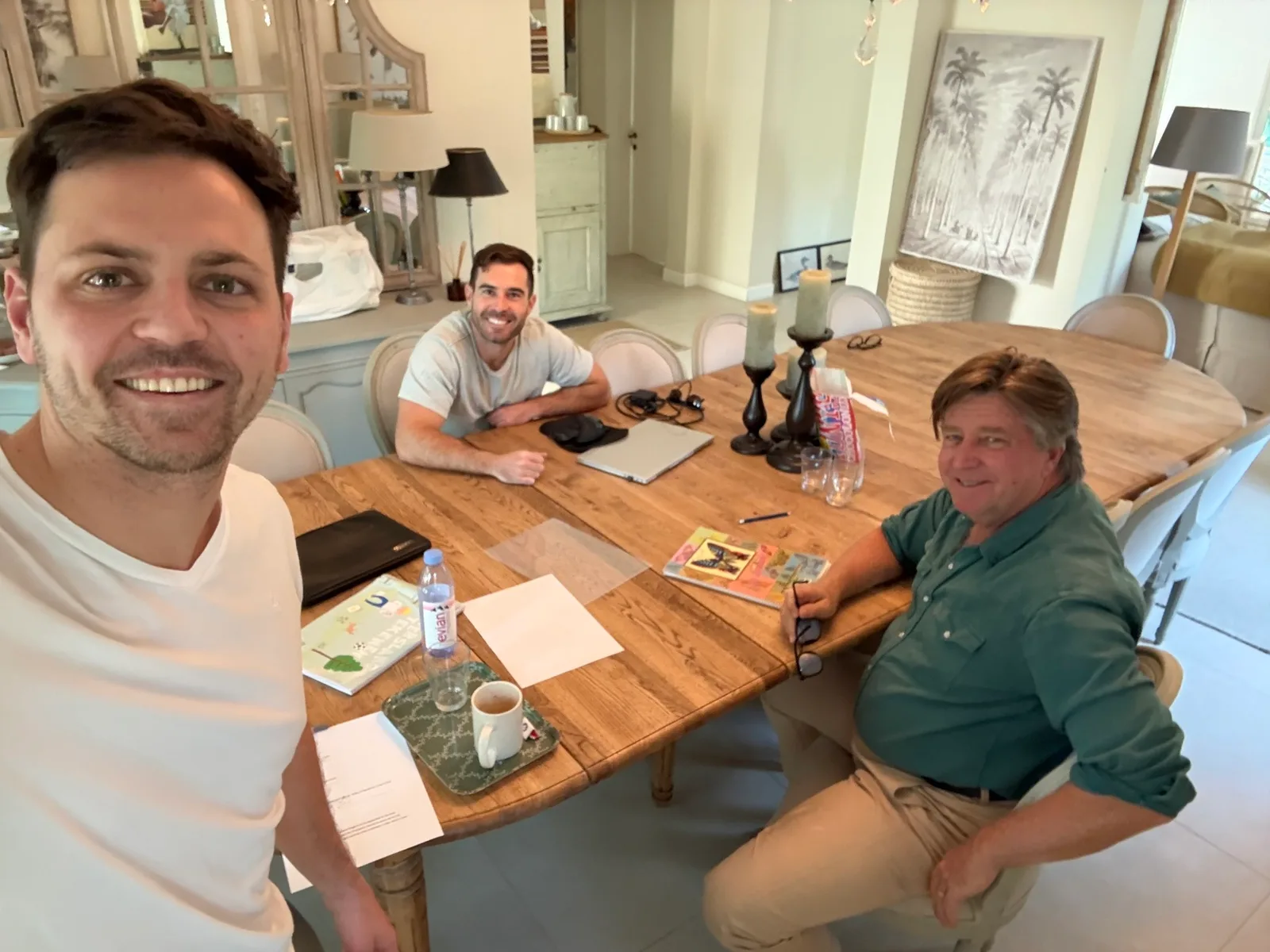 The Astrix founding team working together around a table